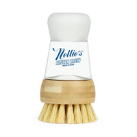Nellie's Kitchen Brush with wooden handle and white bristles on a white background, branded 'Nellie's Kitchen Brush'.